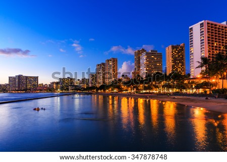 Honolulu skyline and Waikiki beach at twilight, Hawaii. USA