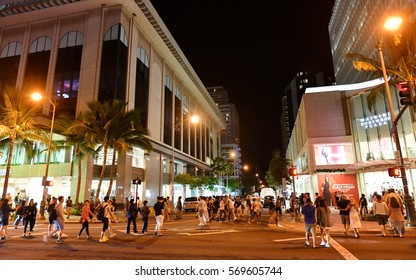 Honolulu, USA - November 24, 2016: People Gather In Waikiki's Shopping And Entertainment District.