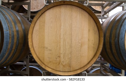 Hood River, OR - February 17, 2017: A Row Of Wine Barrels Filled With Beer At Local Brewery.