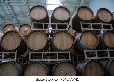 HOOD RIVER, OR - January 2, 2017: Rows Of Wine Barrels Age Beer, At A Local Craft Brewery