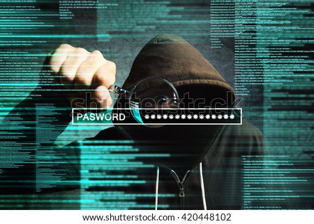 Hooded computer hacker with magnifying glass stealing internet password, online security concept.