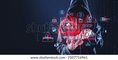 Hooded man hacker attack system, cyber crime and system damage. Warning alert sign hologram and glowing digital security and infographics. Concept of digital threat and data breach