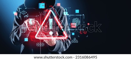 Hooded man hacker finger touch tablet in hand, double exposure red security alert sign and diverse glowing cybersecurity icons. Concept of cyber attack and data protection