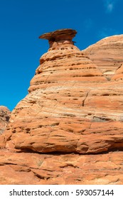 Hoodoo On The Trail To The Wave In Paria Canyon-Vermilion Cliffs Wilderness, Massive Sandstone Structures Stretched Like Taffy, And Cinnamon Color Strata Domes