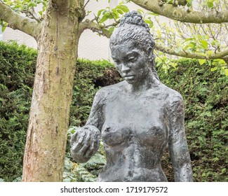 HOOFDDORP-APRIL 25 2020. Hidden Behind The John The Baptist Church In Hoofddorp, Is A Beautiful Garden With Several Statues. All Of Them Refer To Passages From The Holy Bible. 