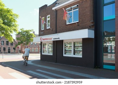 Hoogeveen, Netherlands- August 7, 2022: Alteveerstraat with real estate agency Hentenaar, Netherlands