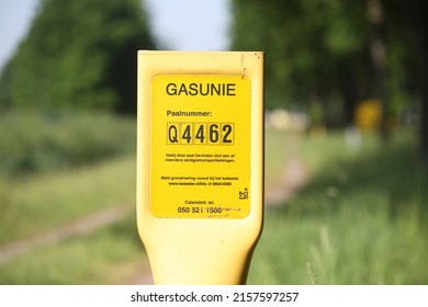 Hoogeveen, Netherlands- May 18, 2022: Yellow sign of Gasunie in Buitenvaart in Hoogeveen, Netherlands