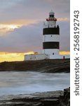 Hook Head Lighthouse (1810) at sunset, Hook Head, Co. Wexford, Ireland