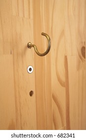 Hook on wooden panel