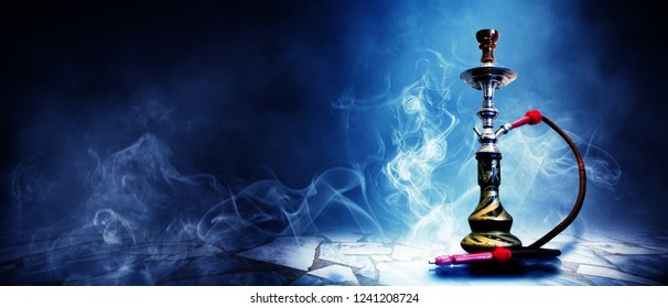 Hookah on a dark abstract background, smoke, fog, neon, concrete, rays