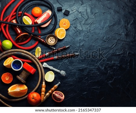 Hookah with orange, lime, lemon and grapefruit. Relaxation citrus hookah tobacco. Space for text