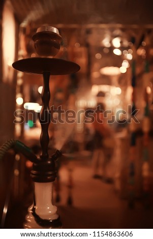 hookah in the restaurant / hookah elements on the background of a blurry interior of the restaurant, a cafe with a bokeh