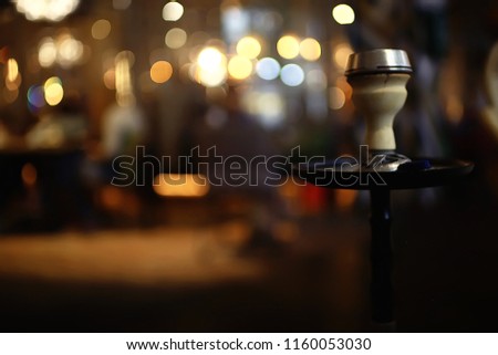 hookah in the restaurant / hookah elements on the background of a blurry interior of the restaurant, a cafe with a bokeh