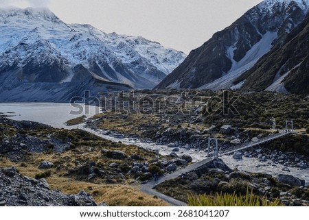 Hooker Valley is an easy, beginner-friendly alpine trail in Aoraki National Park, offering stunning views of snow-capped peaks and glacial rivers.