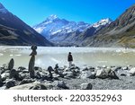 Hooker valley, one of the beautiful tracking in canterbury region, New Zealand. Trekking to Hooker lake and scenic view of Mount Cook with snow and blue sky. Spending time for vacation with nature.