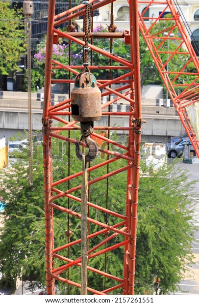 hooks\
of the mobile crane on working, Lifting hoisting mechanism with bog\
hook and steel cable of the machine bridge\
crane.