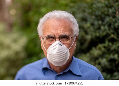 HOOVER, ALABAMA - APRIL 7, 2020: 66 Year Old White Male Wearing A Hygienic Face Mask.