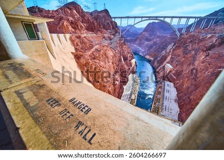 Hoover Dam and Colorado River with Warning Sign Eye-Level View