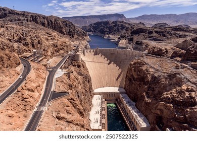 Hoover Dam is a concrete arch-gravity dam in the Black Canyon of the Colorado River, on the border between the U.S. states of Nevada and Arizona. - Powered by Shutterstock