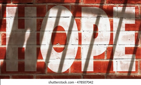 Hope Written On A Wall With Jail Bars Shadow