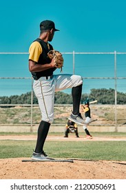 I Hope You Know How To Swing. Shot Of A Young Baseball Player Getting Ready To Pitch The Ball During A Game Outdoors.