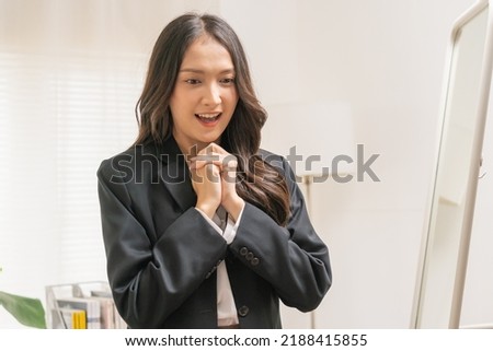 Hopeful, Christian asian young woman, girl in suit formal, smiling and praying to God make a wish at home before job interview of change career, recruitment employee or staff in company, corporate.