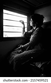 A Hopeful Indian Working Poor Woman Train Journey In Hot Summer Day