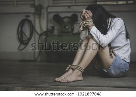 hopeless man hands tied together with rope, human trafficking, Stop abusing violence.