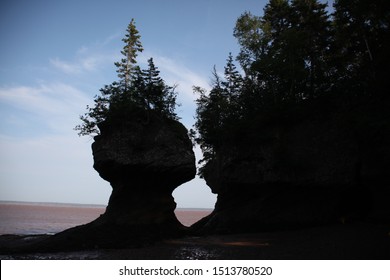 The Hopewell Rocks At New Brunswick Are Said To Have Been Formed When The Indigenous People Were Trying To Escape From A Monster That Turned Them Into Stone As They Were Going Out To Sea.  