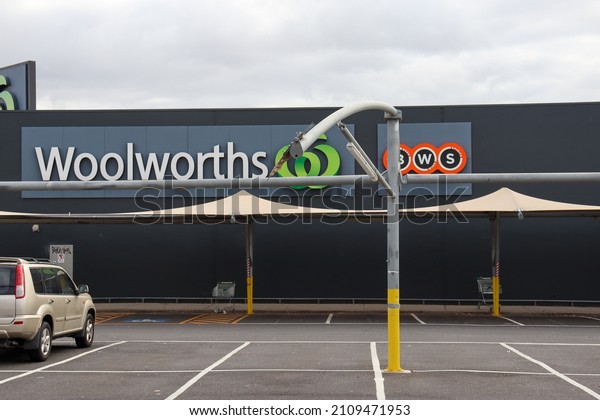 Hoppers Crossing, Vic\
Australia - January 18 2022: View of Woolworths store with car park\
and shade sails