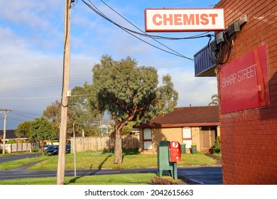 Hoppers Crossing, Vic Australia - Sept 13 2021: Suburban Corner Store With Chemist And Post Office Box