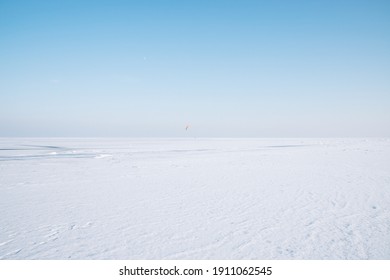 Horizon Of The Frozen Sea On The Ice A Lot Of Snow Blue Sky No Clouds Bright Day On The Horizon Footprints In The Snow Footpath From People