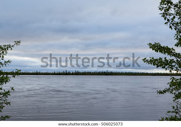 Horizon line between the river and the sky.
Indigirka River. Yakutia.
Russia.