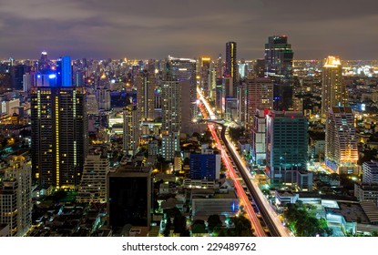 Horizon Night Bangkok city view skyline with skyscrapers and traffic