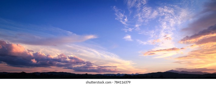 Horizon panorama mountain and dramatic twilight sky and cloud sunset background