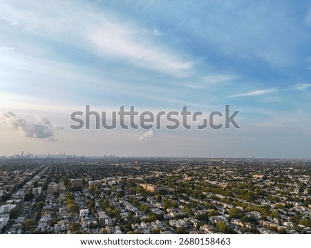 The horizon reveals a distant skyline, while the foreground is dominated