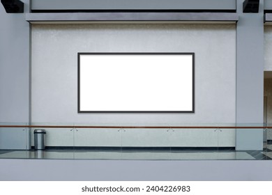 Horizontal advertising blank mockup on light textured wall. OOH out of home framed poster template. Modern shopping mall interior.
