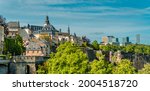 Horizontal Aerial panorama view of Luxembourg-City with the fortress wall, the Casemates, and Kirchberg skyline