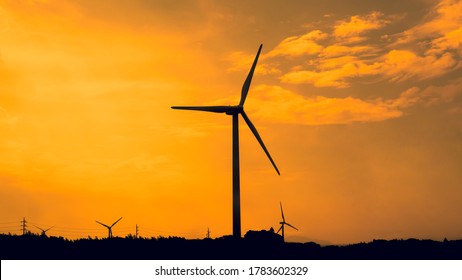 Horizontal Axis Wind Turbine With Sunset Sky Background , Clean Energy Concept