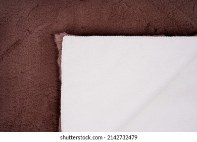 horizontal banner of a carpet with brown fur close-up.Design concept.Texture of a brown corner carpet.textile material macro close-up. Flat lay, top view, copy space for text.cozy home carpet