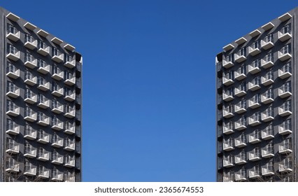 Horizontal banner. Concrete panel house against blue summer sky. Concept of construction, Soviet architecture, real estate rental agency, rent apartment, buying house, mortgage. Copyspace. Tbilisi - Shutterstock ID 2365674553