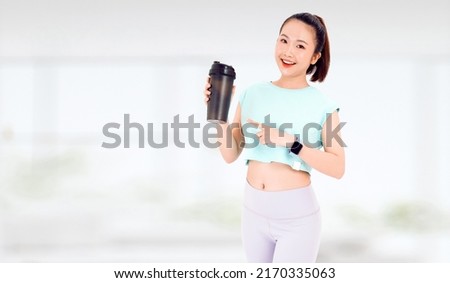 Horizontal banner with copy space of a Asian woman with healthy diet protein shake drinking for sport and fitness or weight control with replacement meal