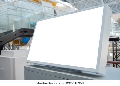 Horizontal blank digital interactive white display of electronic kiosk at exhibition or museum with futuristic scifi interior: close up. White screen, mock up, future, copyspace, technology concept - Shutterstock ID 2095018258
