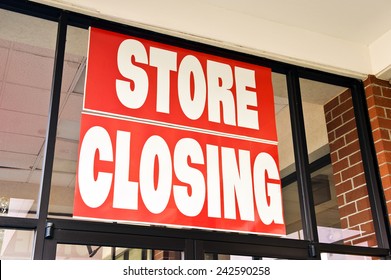 Horizontal Close Up Shot Of Store Closing Sign On Business