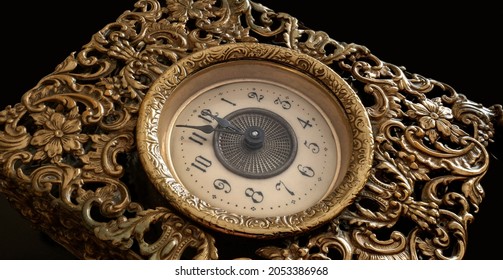 Horizontal close up view of ancient piece clock pointing countdown to midnight eve.New year concept Useful for banner.