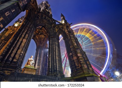 Horizontal colour image of Scott Monument and russian wheel in the background, Edinburgh, Scotland