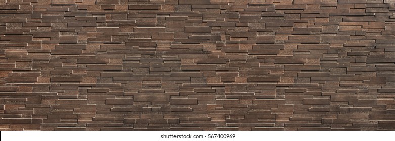 It Is Horizontal Dark  Brown Brick Wall For Pattern And Background.