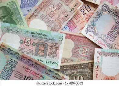 Horizontal flat-lay of old vintage notes arranged in a random arrangement