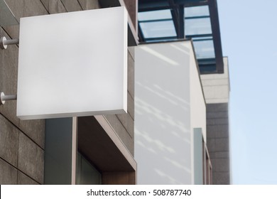 Horizontal front view of empty square signage on a building with modern architecture