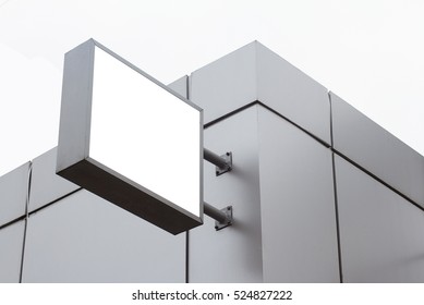 Horizontal Front View Of Empty Square White Signage On A Building With Modern Metallic Plates 